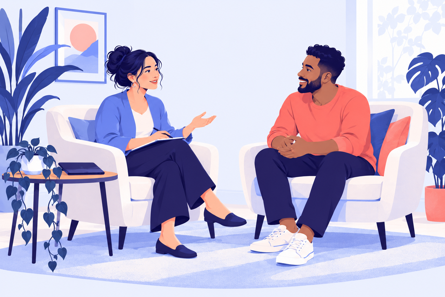 A therapist and client sharing a warm conversation.